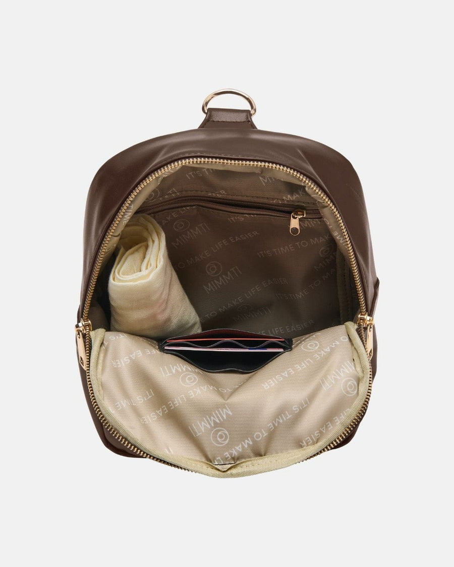 MIMMTI Zoya met alle cadeaus Espresso