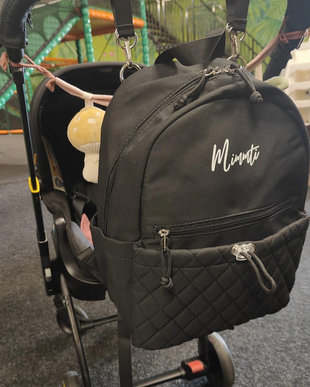 Aan de kinderwagen of op je rug