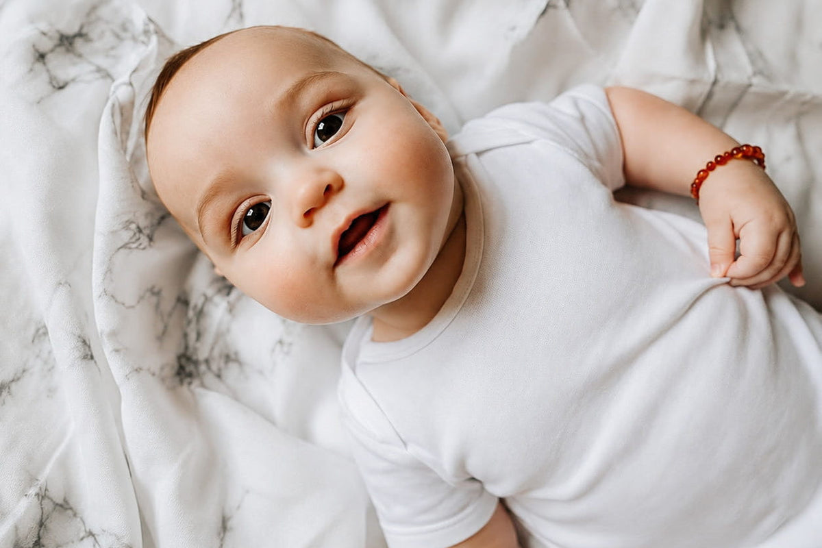 Zwemmen met je baby: na het zwemmen lekker op een hydrofiele doek