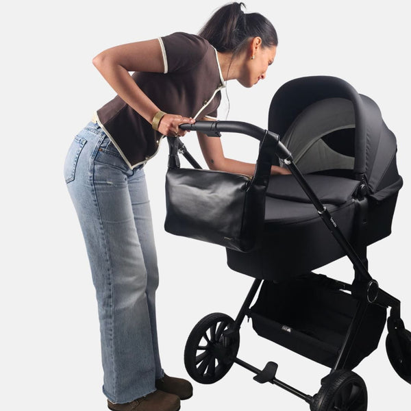 Aan de kinderwagen