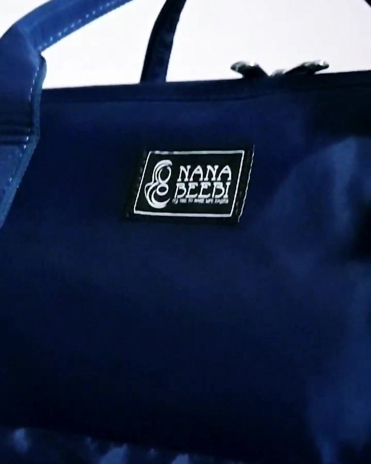 NanaBeebi 1.0 blauw met oud NanaBeebi-logo
