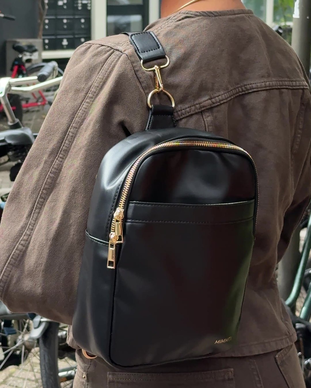 Crossbody, rugzak of aan de kinderwagen